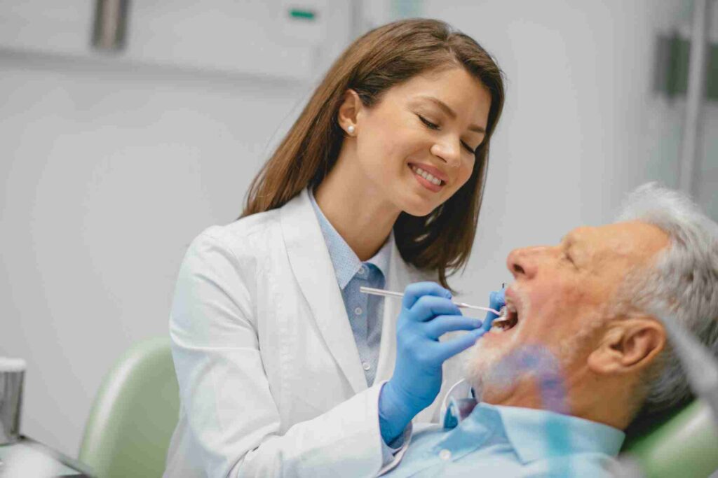 Senior man at the dentist.