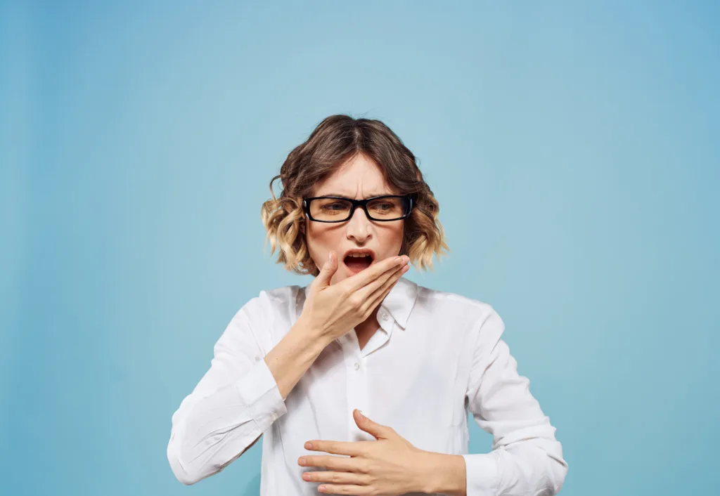 Woman in Surprise Wearing Glasses and White Shirt