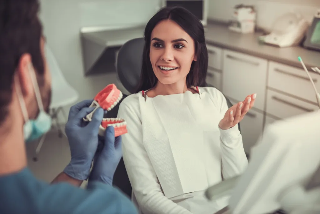 Woman Receives Dental Consultation in Modern Office